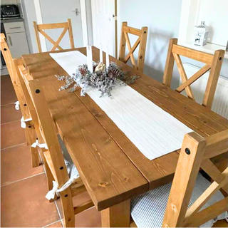 Our rustic dining table, crafted from solid wood. Handmade with care, each table exudes character and sustainability, embodying the essence of a modern farmhouse kitchen.