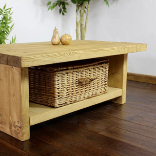 Lymington Handmade Rustic Wood Coffee Table: A sturdy, artisan-crafted centerpiece with a built-in shelf for added functionality, perfect for rustic-inspired living rooms.