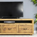 Solid wood tv unit in a medium oak finish, featuring 3 drawers with black metal handles in a chunky rustic style. Handcrafted in the New Forest.
