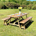 Reclaimed solid wood outdoor patio dining table set, finished in a chunky rustic style. Handcrafted in the New Forest.