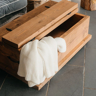 Discover the rustic elegance of our Beaulieu chest coffee table — a statement piece that seamlessly blends functionality with exquisite craftsmanship. This generously sized coffee table offers ample surface area, perfect for your morning coffee.