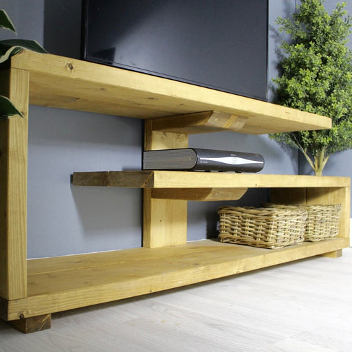 Solid wood chunky rustic tv unit with storage in a medium oak finish, handcrafted in the New Forest.