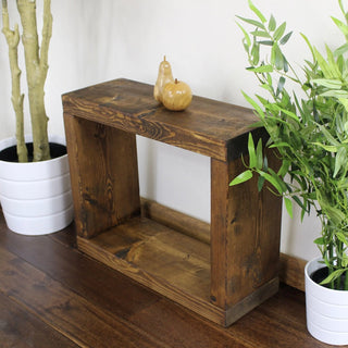 Elevate your décor with the Hyde Handmade Rustic Single Cube Table, crafted from solid wood for a touch of natural charm in any room.