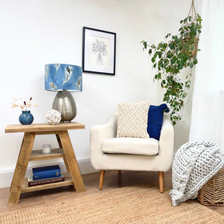 Elevate your living space with the rustic elegance of our reclaimed Yarmouth side table. Crafted from solid, recycled wood, this small accent table showcases the natural allure of distressed wood, ideal for cottage or farmhouse-inspired interiors. 