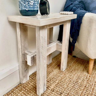 Image of the Ryde Reclaimed Solid Wood Small Side Stool, showcasing its rustic charm and sustainable craftsmanship, perfect for adding warmth and character to any space.