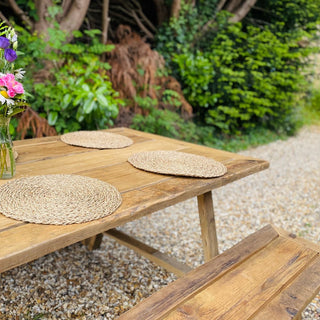 Discover rustic charm with the Harlow Handcrafted Garden Dining Table. Made from reclaimed wood, it offers sustainable outdoor dining in style. Matching benches available.