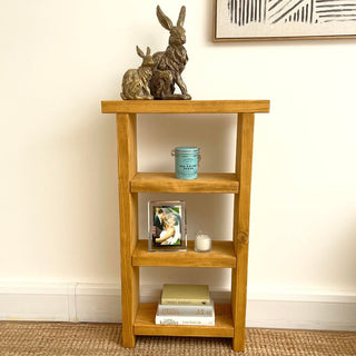 Discover bespoke storage with the Winsor Solid Wood Narrow Rustic Bookshelf, offering a blend of rustic charm and functional elegance in its tall and narrow design.