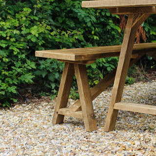 Explore rustic charm with the Harlow Handcrafted Garden Dining Table. Crafted from reclaimed wood, it offers sustainable outdoor dining. Matching benches available.