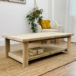 Image of the Ryde coffee table, meticulously handcrafted from reclaimed wood, featuring a clear finish that beautifully accentuates the natural wood grain. The table exudes rustic charm and sustainable craftsmanship,.