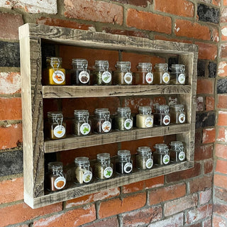 Discover the rustic charm of our reclaimed spice rack, perfect for organizing spices in your kitchen. Crafted from salvaged wood, this spice storage solution adds a touch of rustic elegance to any kitchen decor.