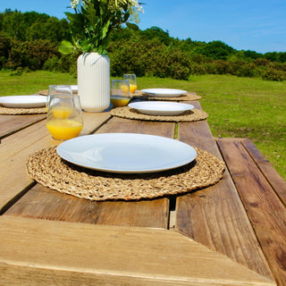 Experience the timeless elegance of the Harlow Handcrafted Garden Dining Table, crafted from reclaimed wood for eco-friendly outdoor living.