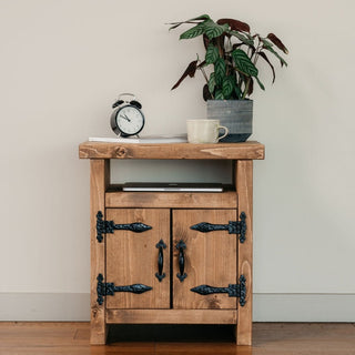 The Alderbury side table exudes rustic charm, perfect for your living room or as a bedside table. Crafted from solid wood, this handmade accent piece adds natural elegance to your home decor.