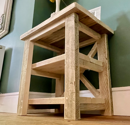 Reclaimed solid wood side table in a clear finish, featuring a cross design in the back of the table bringng a natural influence to any room with its chunky rustic style. Handcrafted in the New Forest.