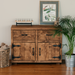 Solid wood sideboard featuring 2 drawers, and 2 doors with black metal work, in a chunky rustic style. Handcrafted in the New Forest.