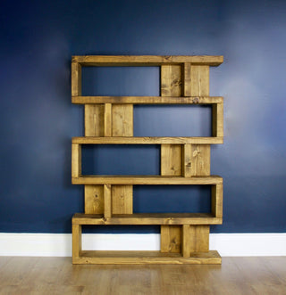 Introducing the Ashdown Solid Wood Rustic Bookcase Shelving Unit, a versatile storage solution for your home. This rustic bookcase features sturdy shelving, crafted from solid wood.